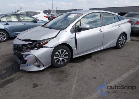 2021 Toyota Prius Prime Limited from USA, damaged, VIN JTDKAMFP1M3183513
